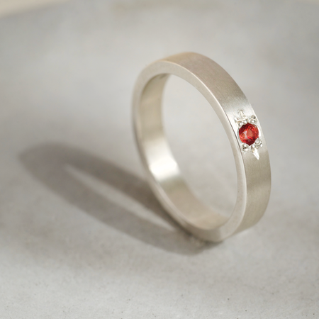 Red sapphire argentium silver ring. Ethically made jewellery.