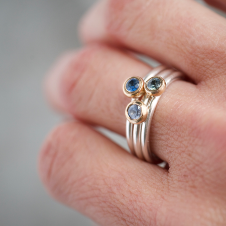 Mixed metal sapphire stacking ring set by Natalie Vernazza elegant jewellery