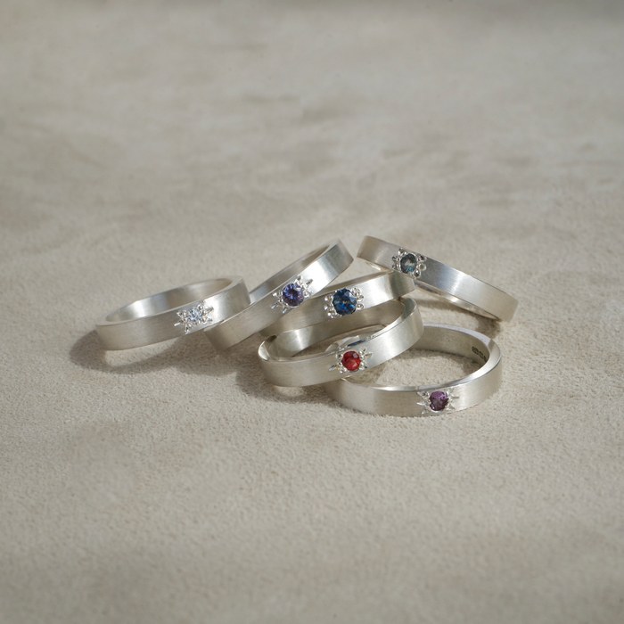 Collection of argentium silver star set gemstone rings by Natalie Vernazza elegant jewellery.
