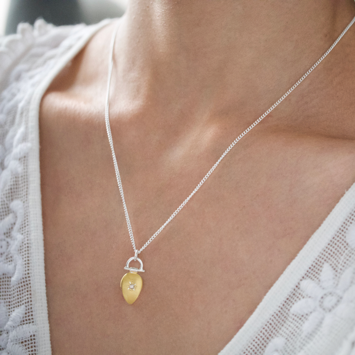 24ct gold keum boo and cognac diamond teardrop pendant on model