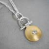 24ct gold keum boo and moissanite pendant closeup