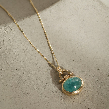 Aqua tourmaline gold pendant from Natalie Vernazza Elegant Jewellery