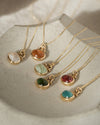 Collection of tourmaline gold necklaces by Natalie Vernazza, elegant jewellery