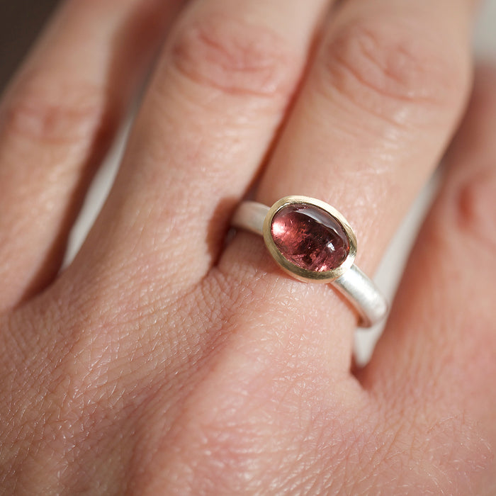 Pink tourmaline gold silver ring by Natalie Vernazza on the hand