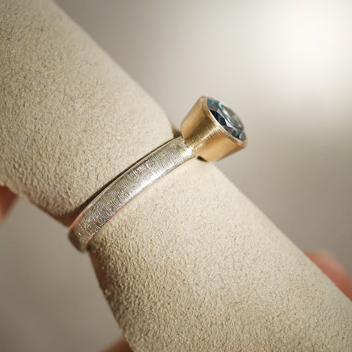 Oval london blue topaz gold and silver contemporary ring by Natalie Vernazza elegant jewellery