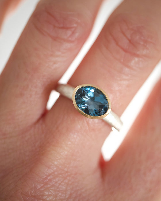 Oval london blue topaz gold and silver ring by Natalie Vernazza elegant jewellery