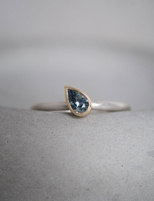Teal sapphire ring set solid silver and gold by Natalie Vernazza elegant jewellery