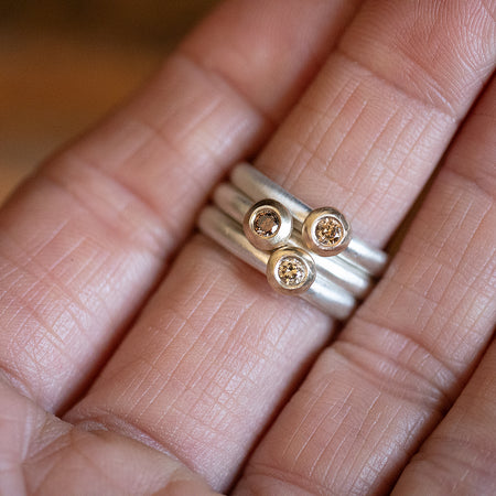 Contemporary warm diamond stacking rings by Natalie Vernazza elegant jewellery