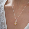 Pink spinel keum boo teardrop pendant on model