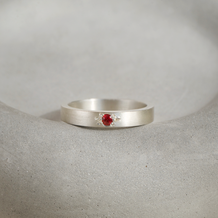 Red Sapphire argentium silver ring. Handmade sustainable jewellery.