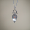 24ct gold keum boo red sapphire pendant, back