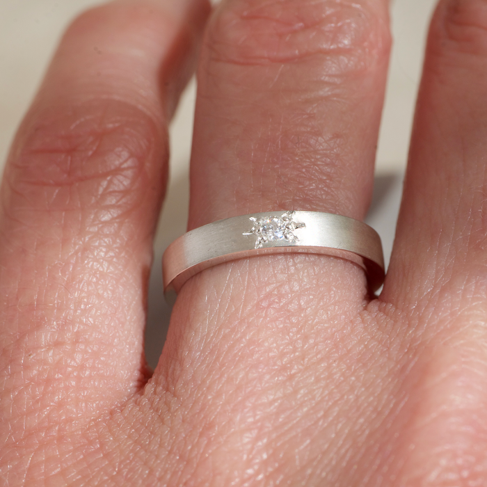 White moissanite star set argentium silver ring
